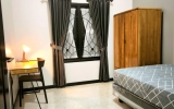 Interior Kamar Tipe A Dengan Meja Dan Lemari Jati